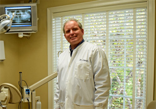 dr. cheek in dental operatory viewing digital x-ray
